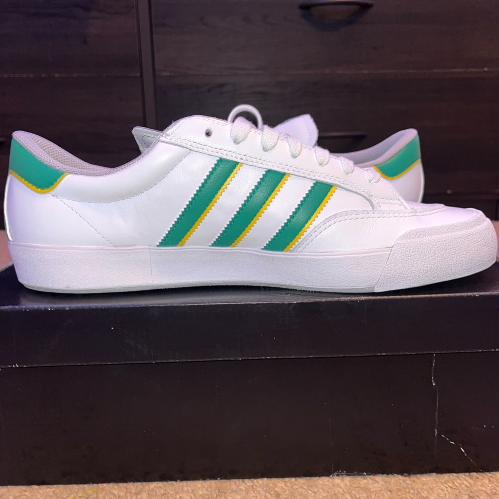 Adidas White Sneakers with Green and Yellow Accents